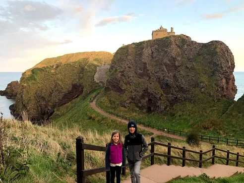 Kids in front of Dunnottar Castle