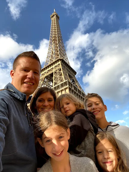 Family in front of Eiffel Tower