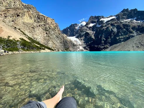 Patagonia Bucket List Lago Azul feet by the water
