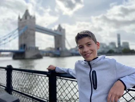 Teen boy in front of London Bridge