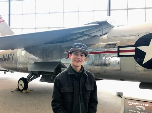 Posing with plane in Museum of Flight