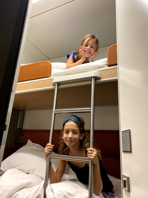 Kids on sleeper train bunk beds